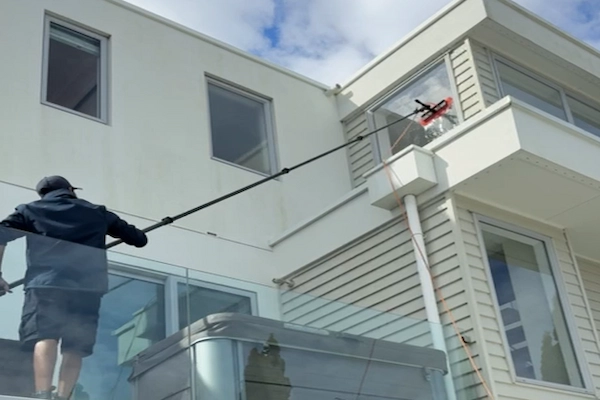 Cleaning a skylight and glass sliding door on a Tauranga home